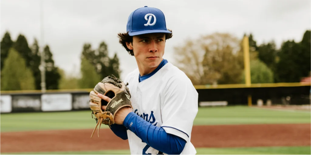 Baseball Player Wearing Custom Hat With Team Logo