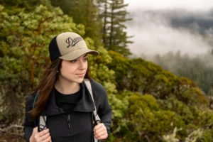 Woman Hiking and Wearing Custom Richardson Hat For Brands
