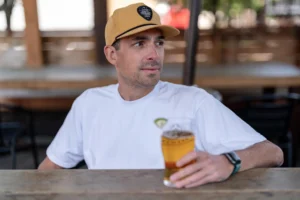Man Drinking Beer Wearing Custom Richardson Hat