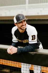 Baseball Player Wearing PTS20 Custom Ultra CU Uniform 2 Button Jersey & Custom Hat