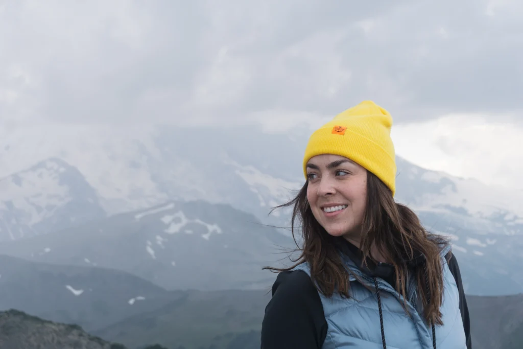 Woman Wearing Custom Richardson Beanie With Woven Clip